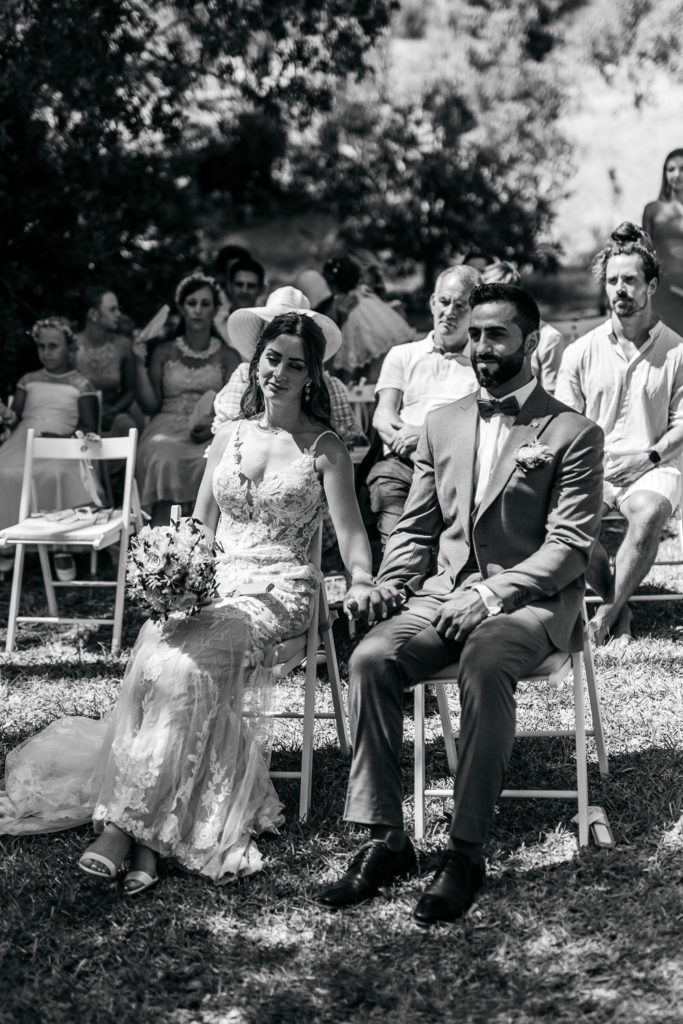 a man and woman sitting in chairs