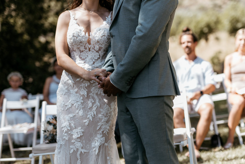 a man and woman holding hands