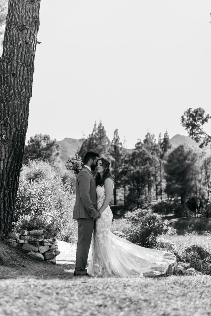 a man and woman standing next to each other