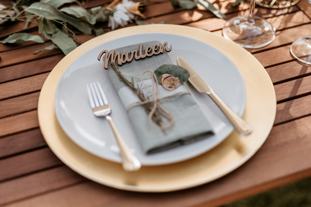 a plate with a napkin and fork on it